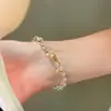 Pulseira de peixe amarelo pequeno com cristal branco em prata de lei S925, uma peça versátil e fashion com um toque de luxo, apresentando um novo estilo chinês e artesanato requintado
