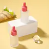 Guangzhou Spot Macaron Frasco de Essência com Ombro Caído Anel Colorido Esfoliante Óleo Essencial Engarrafado Frasco com Conta-gotas 30ml