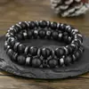 Pulsera Elástica de Piedra Volcánica Obsidiana Negra Cuentas Negras Moda Única Set de 2 Piezas para Hombres para Viajes y Vacaciones