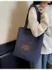 Bolsa de Lona Nueva Transfronteriza 2026 Gran Capacidad Estudiante Viajero Bolso de Hombro Tote Estampado Lindo Estilo Fresco para Estudiantes