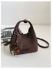 Bolso pequeño de mano de felpa y gamuza elegante transfronterizo para mujer, nuevo, textura retro, bolso tipo cubo, nicho, bandolera, bolso cruzado, moderno