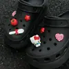 Zapatos de agujero rojos Ankara KT con hebilla de gato, dibujos animados, DIY, lazo lindo, parte superior extraíble, zapatos decorativos, accesorios de flor