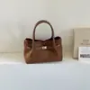 La popular bolsa versátil de este año 2026 principios de otoño nuevo retro para ir al trabajo bolsa de hombro individual para madre e hijo bolsa cruzada de alta gama