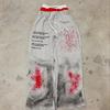 Calça Wide Leg Nova Tendência 2025 Falsa de Duas Peças Série Pintada por Spray para Adolescentes e Casais Hip-Hop Calça de Camada Dupla Atacado