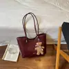 Bolsa Tote Grande Capacidade Shuai Mijia Feminina Outono 2026 Novo Estilo Moda Luxo Leve Nicho Bolsa de Ombro Bolsa para o Dia a Dia