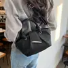 Bolso de cubo de mano de nicho estilo coreano para mujer, nuevo modelo 2026, bolso tote de alta gama para el día a día, elegante bolso de hombro y cruzado