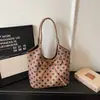Bolso Tote de Commuter de Lunares para Mujer 2026 Nuevo de Moda Primavera Moda Súper Popular Bolso de Hombro Bolso Cubo de Gran Capacidad