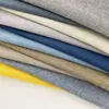 Fornecimento spot tecido de poliéster bicolor imitação de linho para sofá material para sapatos tecido para bolsas almofada de sofá tecido para almofada.