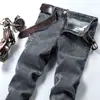 Venta al por mayor Jeans de Primavera y Otoño para Hombre Corte Slim Pierna Pequeña Pantalones Largos Grises Estilo Coreano Modernos Juveniles Elásticos Casuales