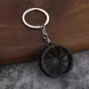 Llavero de cubo de rueda modificado para coche de venta caliente transfronterizo, redondo, decoración de cubo de rueda creativa de Amazon, colgante