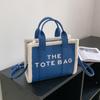 Bolsa de Mão Têxtil Tendência Letra Cor Sólida Nova Transfronteiriça Feminina Versátil para Trabalho Ombro Transversal Bolsa Tote de Lã de Cordeiro