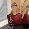 Bolso retro de gran capacidad transfronterizo para mujer, versátil para otoño e invierno, nuevo bolso de hombro casual con patrón de diamantes 2026, bolso tote texturizado