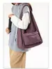 Bolsa de tela estilo coreano transfronteriza para mujer 2025 Nueva de gran capacidad, ligera, para axila/hombro, bolso de mano simple y casual