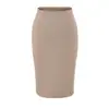Venta al por mayor de ropa para mujer estilo europeo y americano transfronteriza, falda bodycon de cintura media-baja a la moda y versátil, falda midi adelgazante