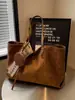 Bolsa Grande Retro Fosca Estilo Coreano para Mulheres 2025 Nova Moda Outono e Inverno Bolsa de Ombro Tote Bolsa para Comutar Bolsa de Axila