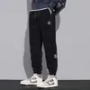 Calça Jogger de Veludo Cotelê Preta Outono Inverno Masculina Versátil Solta Tamanho Grande Estilo Coreano Tendência Calças Casuais Masculinas