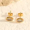 Moda Transfronteriza Europea y Americana, Lujo Ligero, Estilo Minimalista, Pendientes Versátiles para el Día a Día, Pendientes de Tuerca de Circonita, Acero Inoxidable Chapado en Oro con Piedras