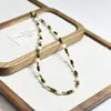 Collar de Acero de Titanio con Cuentas de Concha Ojo de Tigre Diseño Personalizado Cadena para Clavícula de Piedra Natural Perla Cadena para Suéter de Otoño e Invierno Venta al por Mayor