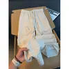 Pantalones jacquard de estilo retro americano con estampado oscuro, colección de verano para hombre, con un diseño fluido de alta gama, corte recto y un ajuste relajado y holgado para uso casual.