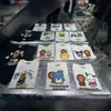 Camiseta de manga corta Bape estilo coreano transfronteriza, nueva co-marca Sanrio, caricatura linda, corte holgado, al por mayor