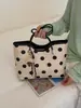 Bolsa Versátil de Linho com Bolinhas Estilo Light Luxury para Mulheres 2026 Nova Bolsa Tote Coreana de Nicho Casual de Alta Capacidade