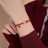 Pulsera Inteligente de Serpiente con Cuerda Roja y Circonita Diseño de Nicho Femenino Exquisita Sensación de Alta Gama Regalo de Año Nuevo Joyería de Mano