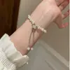"Luz de Luna Blanca" Pulsera de Tirar de Perlas de Imitación Simple Francesa Moda de Gama Alta Pulsera Pequeña Destellante para Cintura de Hombre Versátil