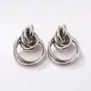 Pendientes exagerados transfronterizos de Europa y Estados Unidos personalidad geométricos de círculo grande metal tendencia temperamento doble tubo hueco pendientes venta al por mayor