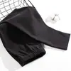 Pantalones largos térmicos sin costuras forrados de polar 2023 nuevos para hombre, pantalones finos de lana para otoño e invierno, pantalones ajustados para base, con hilo