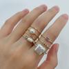 Conjunto de anillo con incrustaciones de perla de aleación chapada en oro de los años 90 de Kenjay ins Wind, Europa y Estados Unidos, nuevo otoño e invierno.