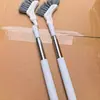 Cepillo de limpieza retráctil popular para uso doméstico, adecuado para ventanas, debajo de las camas, azulejos del baño y esquinas difíciles de alcanzar; mango largo, cuerpo estrecho, cepillo mágico pequeño