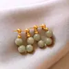Aretes Aguja de Plata Nuevo Estilo Nacional Imitación Jade Temperamento Femenino Moda Celebridad de Internet Elegantes Antiguos Imitación Jade Redondos
