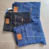 Comercio exterior micro-defecto hombres de negocios pantalones de mezclilla liquidación de fábrica pantalones rectos sueltos puesto de sitio pantalones de hombre al por mayor