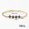 Accesorios de moda de lujo de venta caliente transfronteriza: Pulsera de flor de circón personalizada estilo INS y collar simple de flor de la suerte para mujer al por mayor