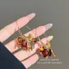 Brincos de Pedra Olho de Tigre Retrô Maillard Novos Brincos de Moda Chinesa Personalidade Versátil Design Criativo para Mulheres