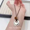 Collar con colgante circular hueco minimalista estilo coreano para mujer, accesorio versátil de nicho de alta gama, cadena para la clavícula única y personalizada