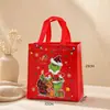 Bolsas de regalo de Navidad de fábrica de venta caliente transfronterizas en stock bolsas de regalo de Navidad no tejidas bolsas de regalo de Navidad impermeables