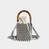 Bolsa Saco com Cordão Design Original para Mulheres 2024 Nova Bolsa com Corrente de Pérolas Bolsa Carteiro Bolsa de Bambu Bolsa de Ombro Único Transversal