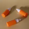 Botella gotero personalizada de aspecto elegante de 10 ml con hombros planos, de colores, para dispensar líquido de esencia, botella de vidrio para aceites esenciales color macarrón