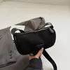 Bolso de mano de alta gama transfronterizo, nueva colección otoño/invierno 2026, diseño retro y minimalista, bolso de hombro pequeño y único, bolso cruzado de gamuza