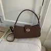 Bolsa Feminina Retrô Tendência Outono e Inverno 2025 Bolsa Feminina Versátil de Ombro e Axila Bolsa Transversal de Veludo de Veado Fosco