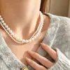 Collar multicapa de perlas barrocas de 6-8 mm para mujer, novedad de 2025, cadena de clavícula ligera, accesorios de nicho de lujo.