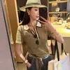 2026 Novo Suéter de Tricô Versátil Estilo Boêmio Luxo Leve Nicho High-End com Gola Lapela Fashion