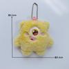 Colgante de monstruo de peluche de dibujos animados, lindo monstruo de tres ojos, bolso de estudiante de ojos grandes, muñeca, máquina, muñeca, venta al por mayor