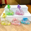 2026 Adornos Acrílicos Lindos Hechos a Mano con Arena Líquida en una Botella, Colgante para Llavero, Juguete Creativo Lindo de Moda para Niños