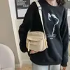 Veludo Cotelê 2026 Primavera Nova Moda Cor Sólida Casual Bolsa de Tecido Estilo Campus para Meninas Pequena de Ombro Único Transversal Tendência
