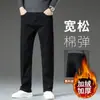 Jeans de hombre primavera 2026 nuevo estilo, corte recto holgado, pantalones casuales elásticos de pierna ancha para otoño y primavera para papás de mediana edad