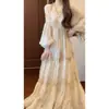 Estilo vacacional francés vestido de hada atmósfera de pintura al óleo temperamento vestido plisado floral cintura ceñida manga abullonada descanso del té falda larga