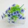 Venta al por mayor transfronteriza 7 Tenedores Eucalipto Flor de imitación Margarita pequeña Ciruela Tela Ramo para exteriores Decoración de planta