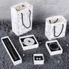 Cajas de joyería del fabricante en stock, cajas de tapa y base, cajas de empaque impresas con tinta para anillos, collares, pulseras, aretes y accesorios, así como bolsos de mano